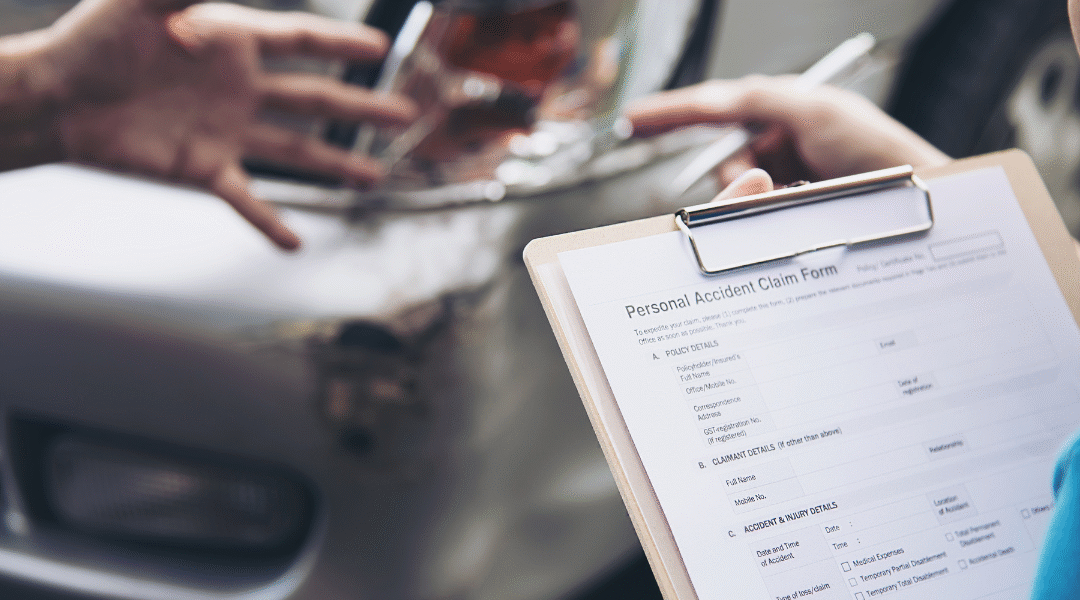 Insurance agent working during on site car accident claim process