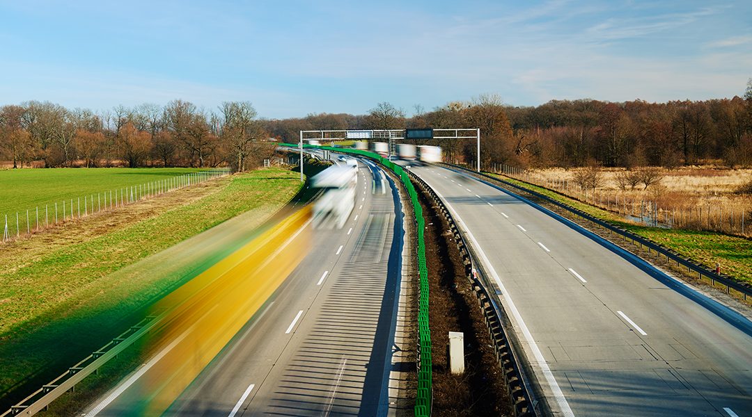Traffic on motorway with motion blurred cars