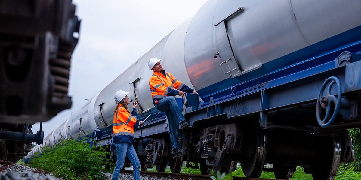 railway inspectors conducting tanker train safety inspection