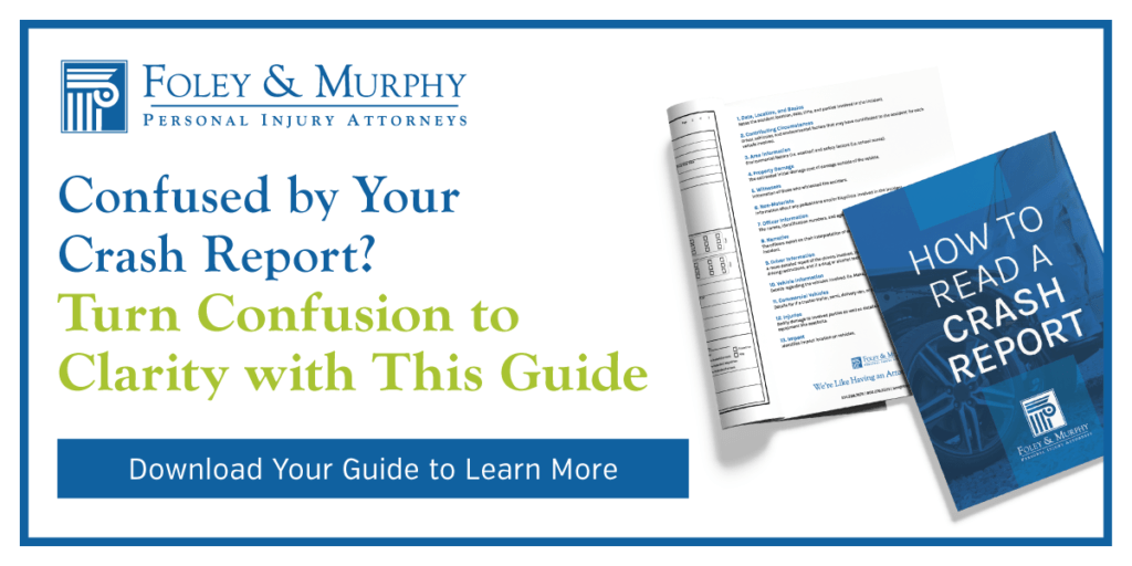 Ad banner from Foley & Murphy offering a guide to understand crash reports, with a blue border and a'Download Your Guide to Learn More' button.